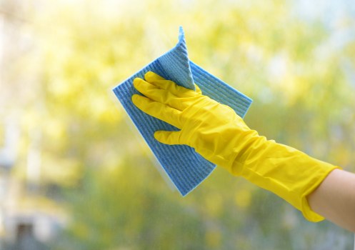 Technician handling carpet cleaning equipment with care