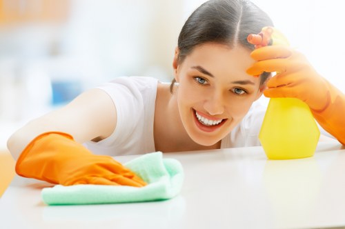 Team member checking a clean workspace for hazards